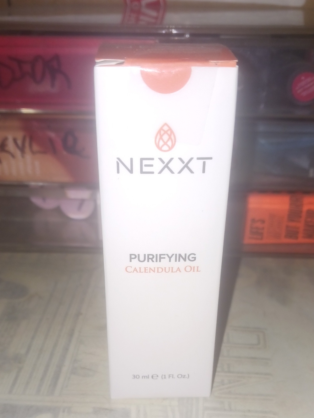 NEXXT Purifying Calendula Oil Serum — White with Peach Accents
